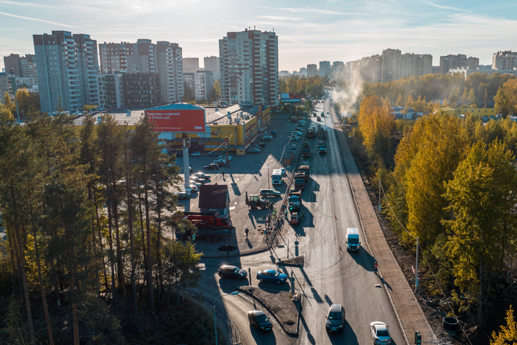 Дорожники завершили укладку асфальта на участке дороги вдоль Нового Девяткино